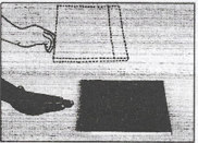 Friction opposes relative motion between the surface of the book and the table